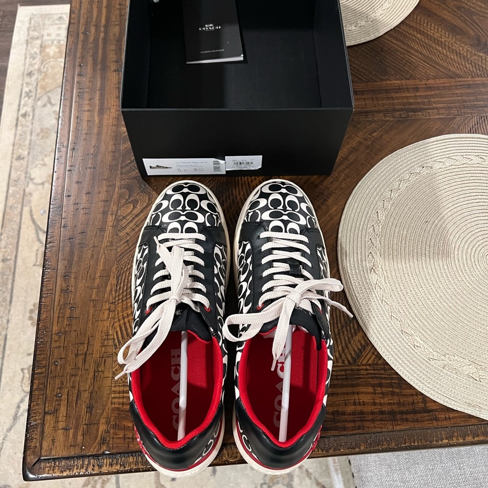 Men’s Coach tennis shoes size 12 the shoes are in excellent condition.